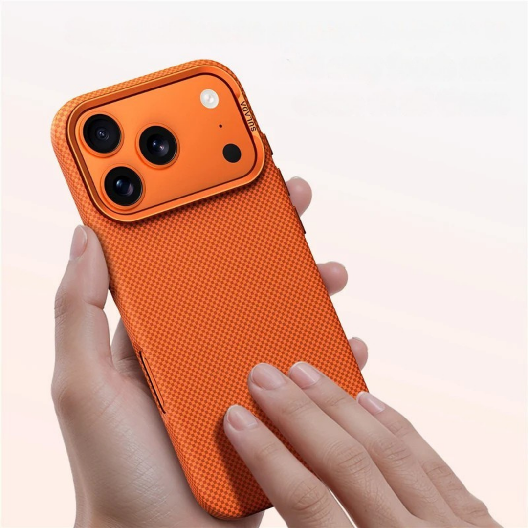 Slim orange MagSafe iPhone case, durable and shock-absorbent, with raised edges for screen & camera.