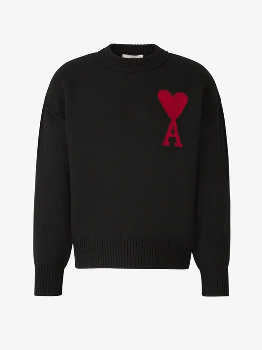 Pullover uomo con motivo cuore, texture morbida, colore grigio e taglio comodo, perfetto per look casual ed eleganti.