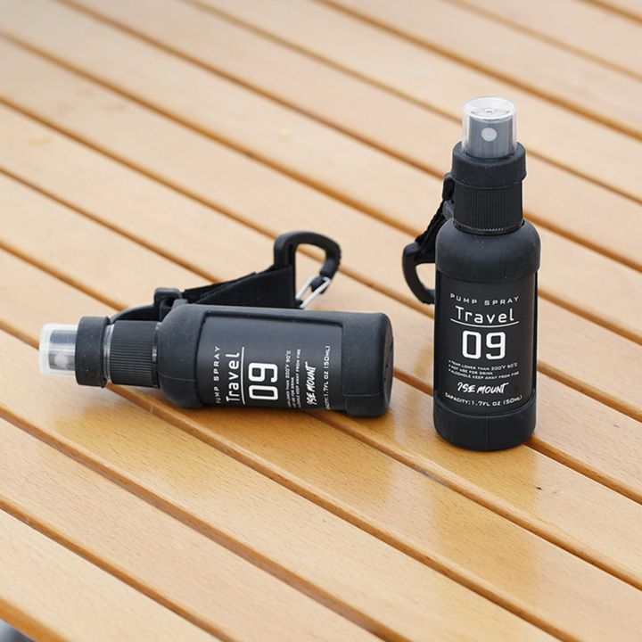 Unisex QuickMist travel accessory spray bottles, perfect for biking, hiking & outdoor adventures
