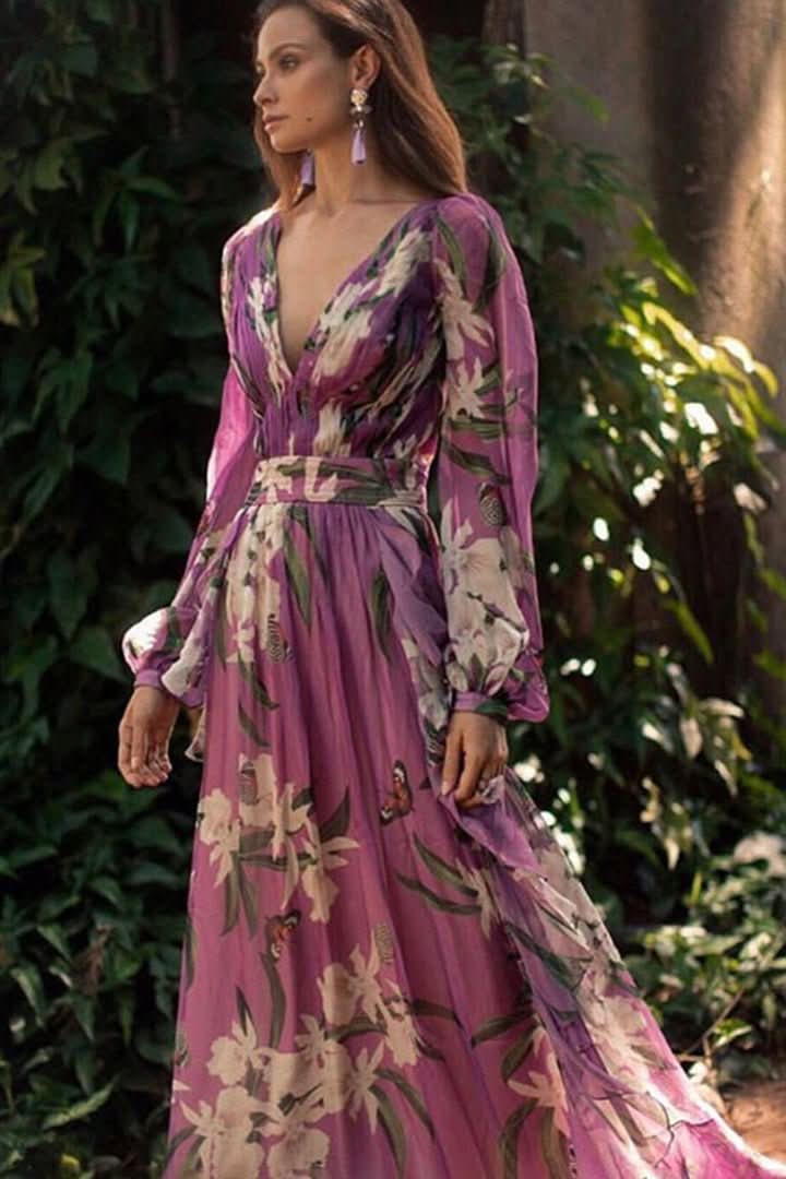 Women's formal radiant purple V-neck maxi dress. Elegant long evening wear for special occasions.