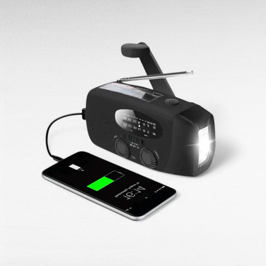 Red emergency hand crank solar radio with flashlight and power bank for outdoor survival