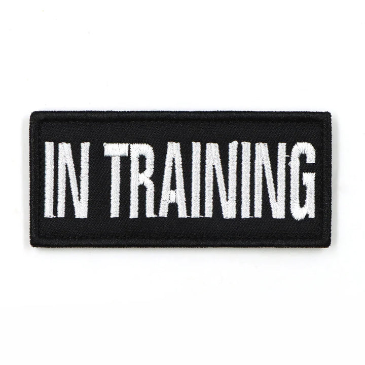Stack of multiple 'SERVICE DOG' patches, ready for bulk purchase as K9 accessories or training aids