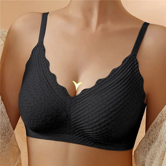 "Reggiseno donna Emilia senza ferretto, cotone bianco; spalline larghe, design traspirante per massimo comfort femminile."