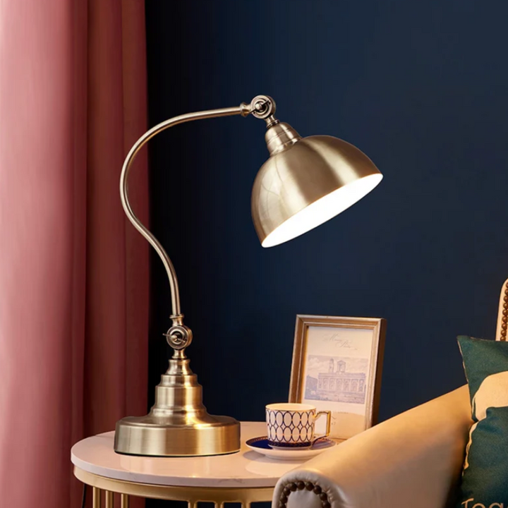 Vintage-inspired Brasselle table lamp in a rich gold finish, perfect retro lighting for any modern living space.