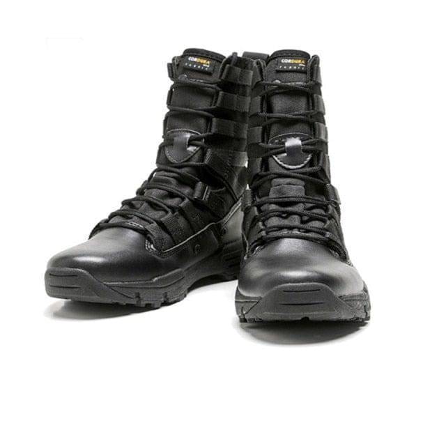 Pair of rugged men's outdoor tactical hiking boots, grey and black, ready for demanding trails and adventures.