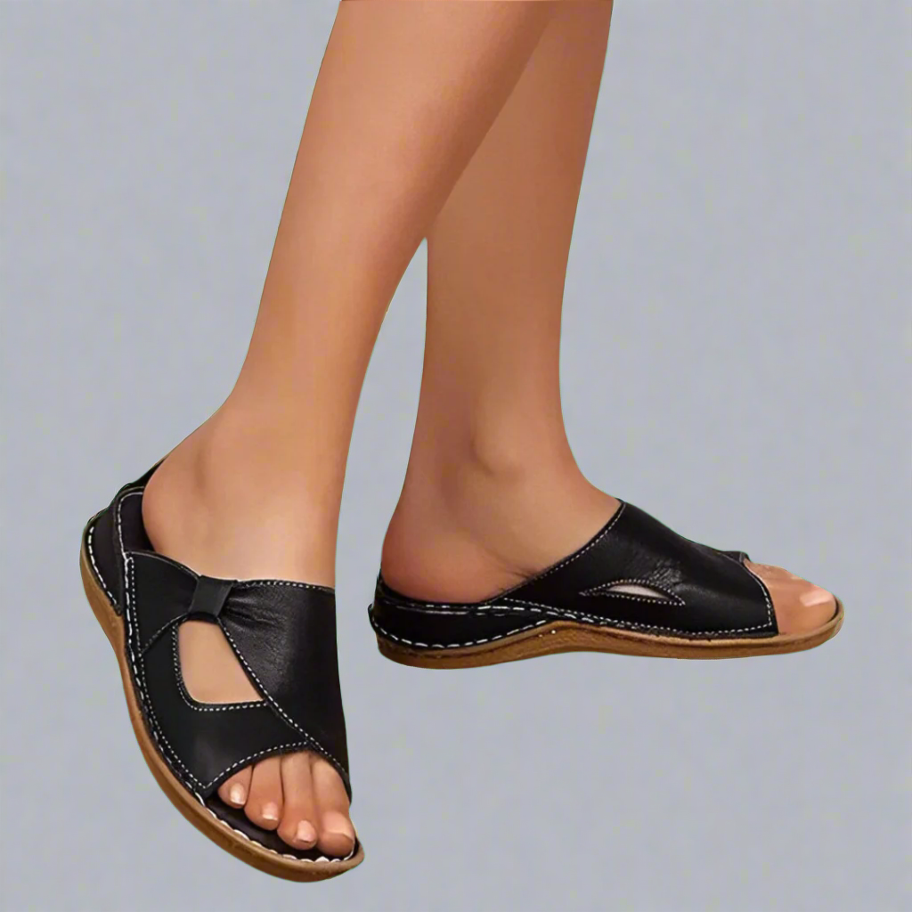 "Sandali ortopedici da donna in pelle rosa con design elegante, comfort superiore e dettagli raffinati."