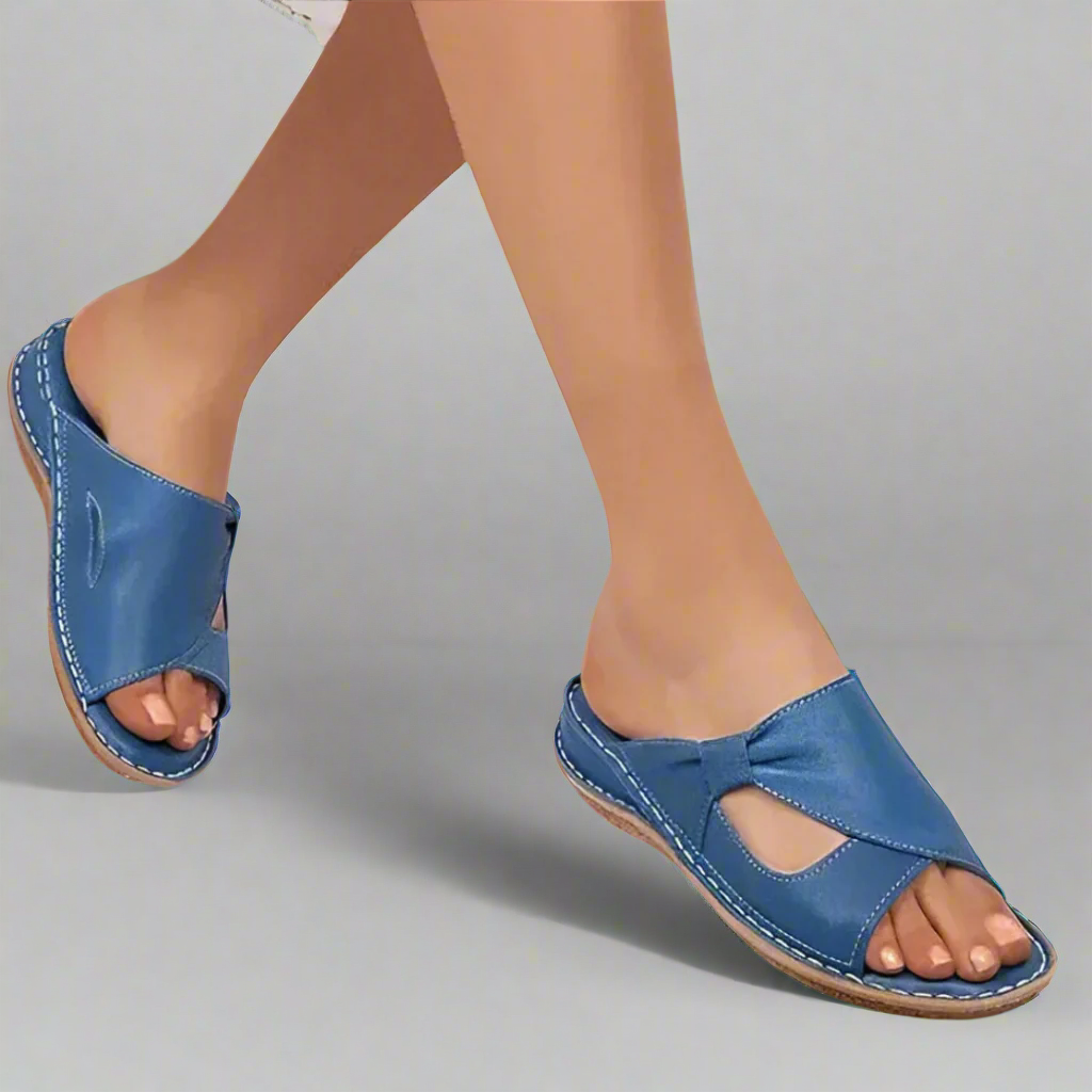 "Sandali ortopedici da donna in pelle rosa con design elegante, comfort superiore e dettagli raffinati."