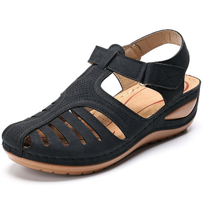 "Sandali ortopedici donna OrthoFlex eleganti in rosa, design ergonomico e soletta adattabile per comfort quotidiano."