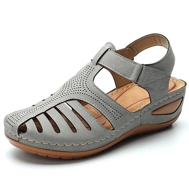 "Sandali ortopedici donna OrthoFlex eleganti in rosa, design ergonomico e soletta adattabile per comfort quotidiano."