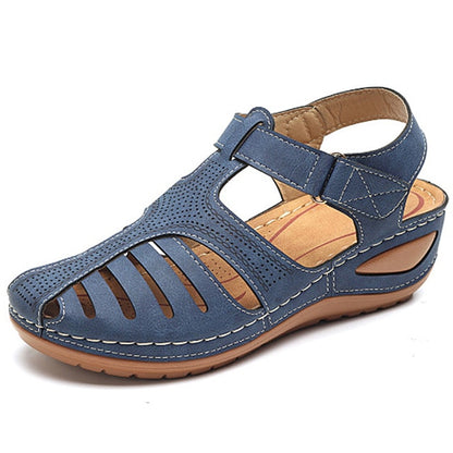 "Sandali ortopedici donna OrthoFlex eleganti in rosa, design ergonomico e soletta adattabile per comfort quotidiano."