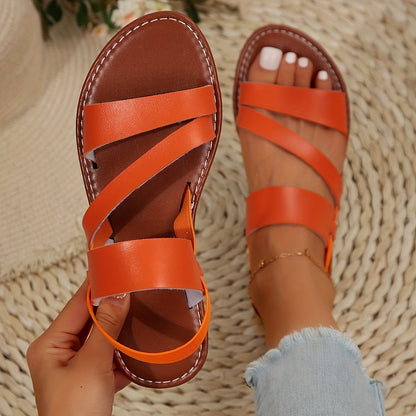 "Sandali ortopedici unisex, marrone, con suola robusta e cinghie regolabili, offrono supporto e comfort per ogni passo."