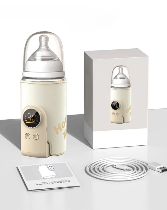"Scaldabiberon wireless SmartBottle, compatto e ricaricabile, in bianco con display digitale, perfetto per viaggi."