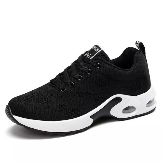 "Scarpe da ginnastica ortopediche unisex, suola ammortizzante, design moderno e accattivante, colore neutro, su erba"