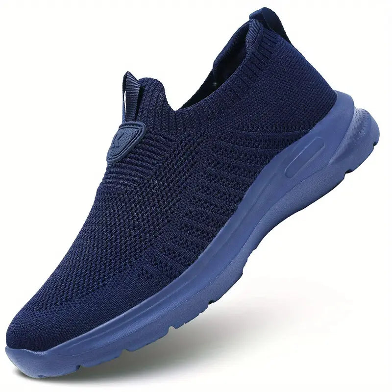 Scarpe ortopediche slip-on uomo da running comode, nere, design moderno, senza lacci per comfort e supporto ottimali.