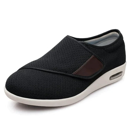 "Scarpe ortopediche ultra-larghe unisex, color nero, cinghie regolabili, suola antiscivolo, comfort e adattabilità."