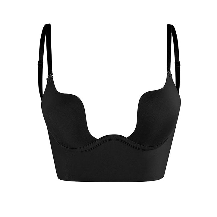 Black seamless strapless bra for women, providing hidden, backless support for evening wear and special occasions.