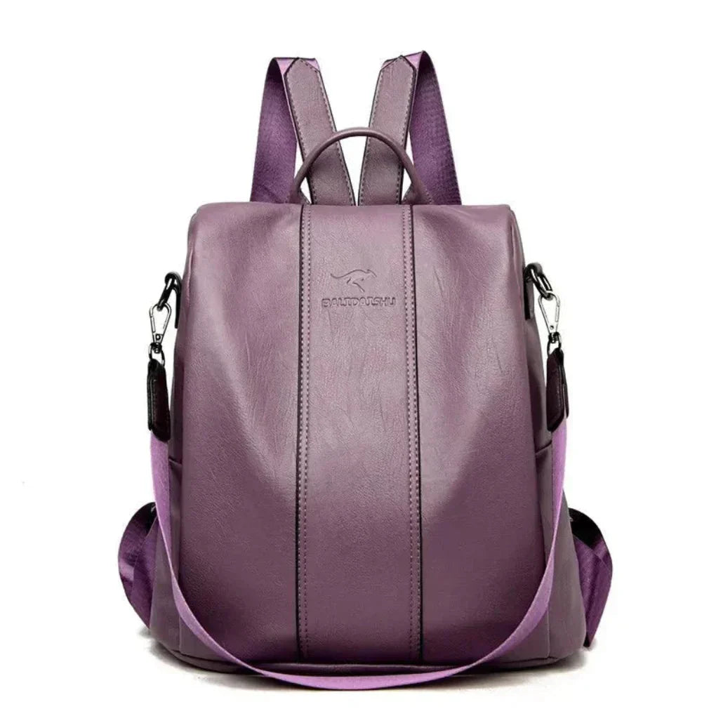 Women's convertible anti-theft travel backpack with multiple hidden pockets for secure items. Versatile & modern.