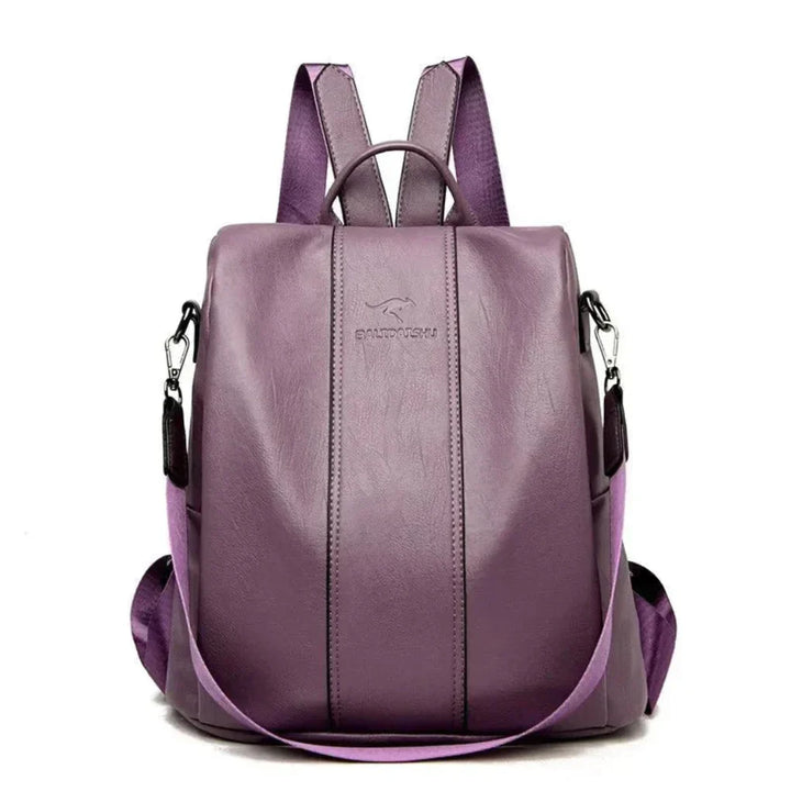Women's convertible anti-theft travel backpack with multiple hidden pockets for secure items. Versatile & modern.