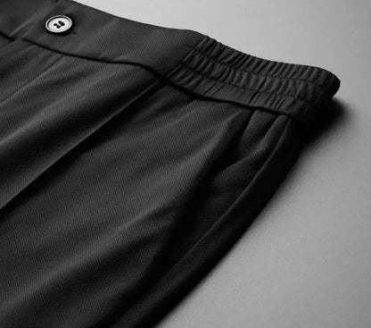 "Set abbigliamento uomo in cotone e lino, camicia elegante e pantaloni abbinati, stile raffinato e confortevole."