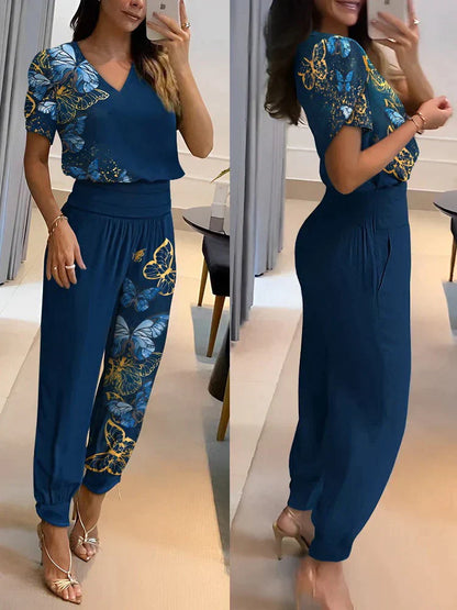 "Set donna con top maniche a sbuffo e pantaloni geometrici, design moderno e versatile, stile casual ed elegante."