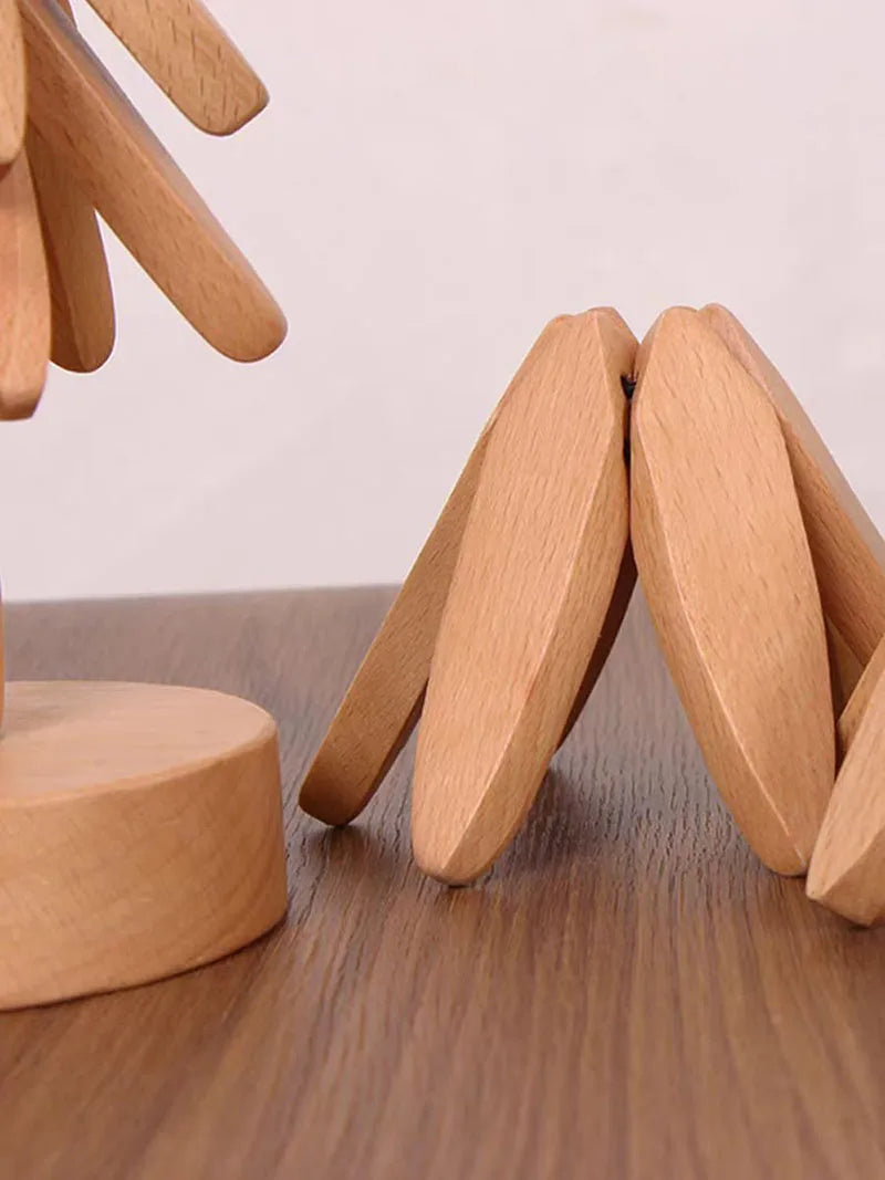 Decorative walnut wood coasters & hot pads, set of 4. Featuring a unique tree design for stylish dining decor.