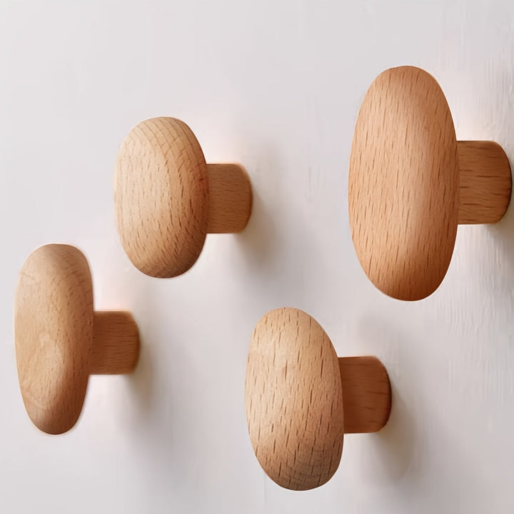 Eco-friendly set of 4 organic pebble wooden hooks. Versatile wall hooks for coats, towels & decor.