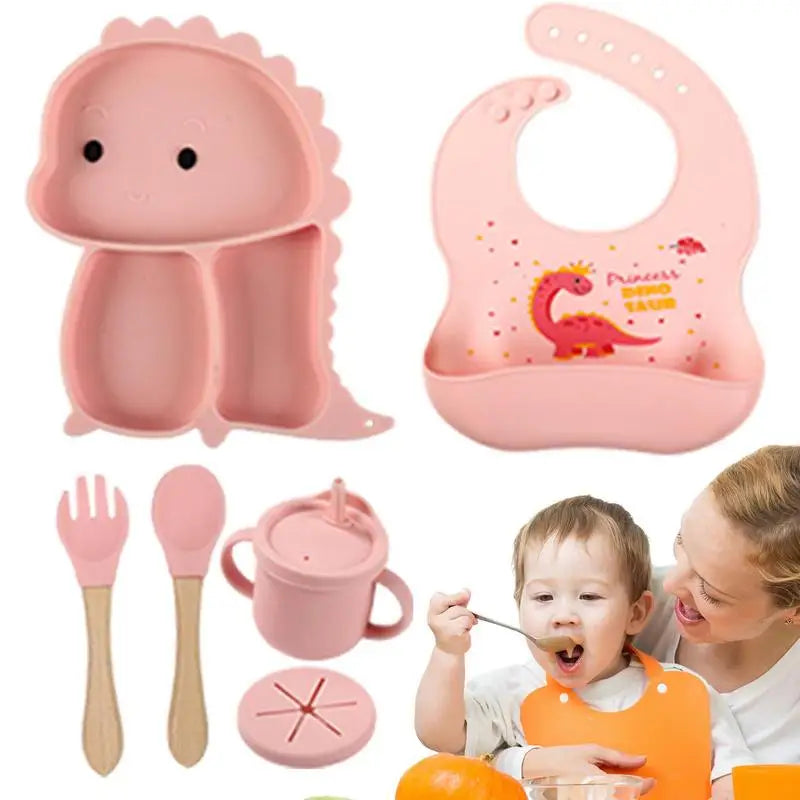 Set stoviglie silicone bambini, design dinosauro blu, antiscivolo, include piatto a ventosa, posate, bavaglino e bicchiere.