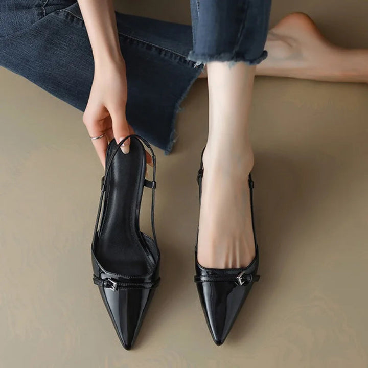 Sophisticated black women's kitten heels, pointed toe & slingback design, comfortable low heel.