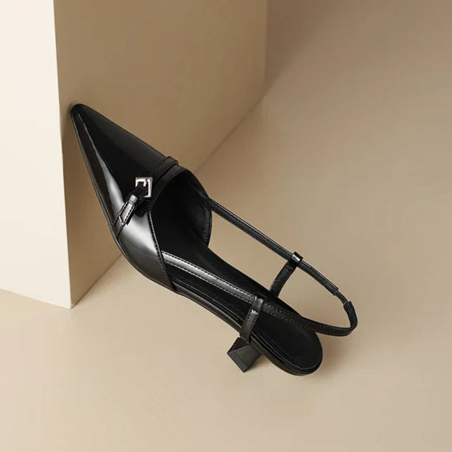 Classic black pointed toe kitten heels, elegant women's dress shoes with a low heel.