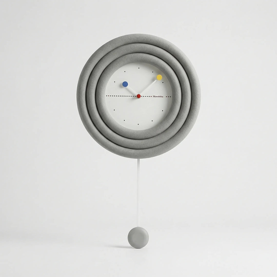 Elegant minimalist pendulum wall clock, a stylish round accent for contemporary home decor.