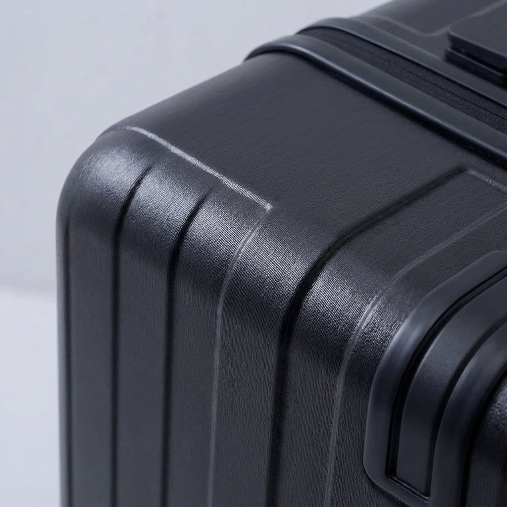 Wheeled smart carry-on suitcase for easy travel. Features front opening, USB charger & internal organization.