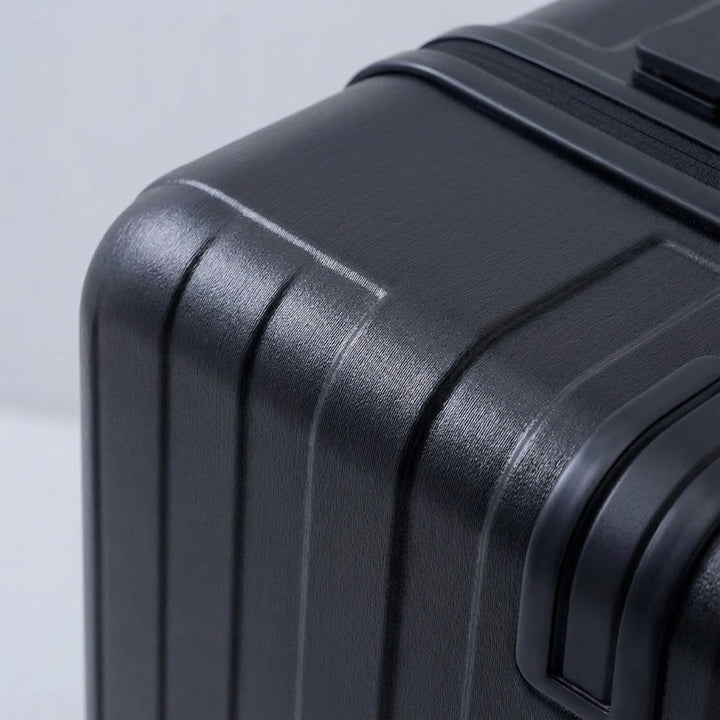 Wheeled smart carry-on suitcase for easy travel. Features front opening, USB charger & internal organization.