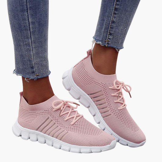 "Sneakers donna eleganti in mesh beige, traspiranti e leggere, con suola ammortizzante e design moderno per ogni occasione."