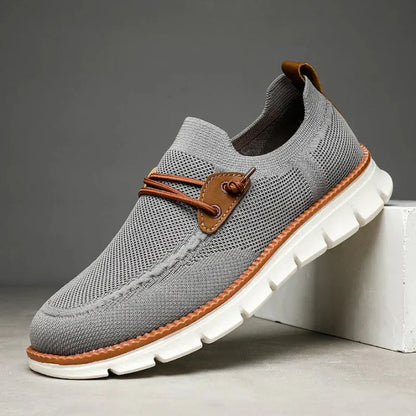"Sneakers uomo comode in grigio, khaki e nero, design moderno, suola morbida, ideali per comfort e stile quotidiano."