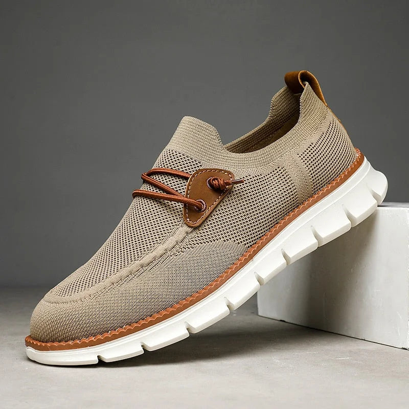 "Sneakers uomo comode in grigio, khaki e nero, design moderno, suola morbida, ideali per comfort e stile quotidiano."