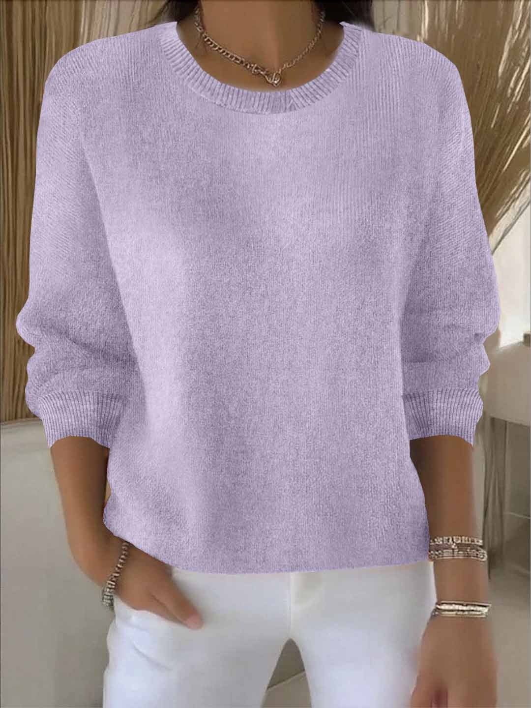 Elegant yet casual women's sweater, soft knit, flowy fit for versatile styling.