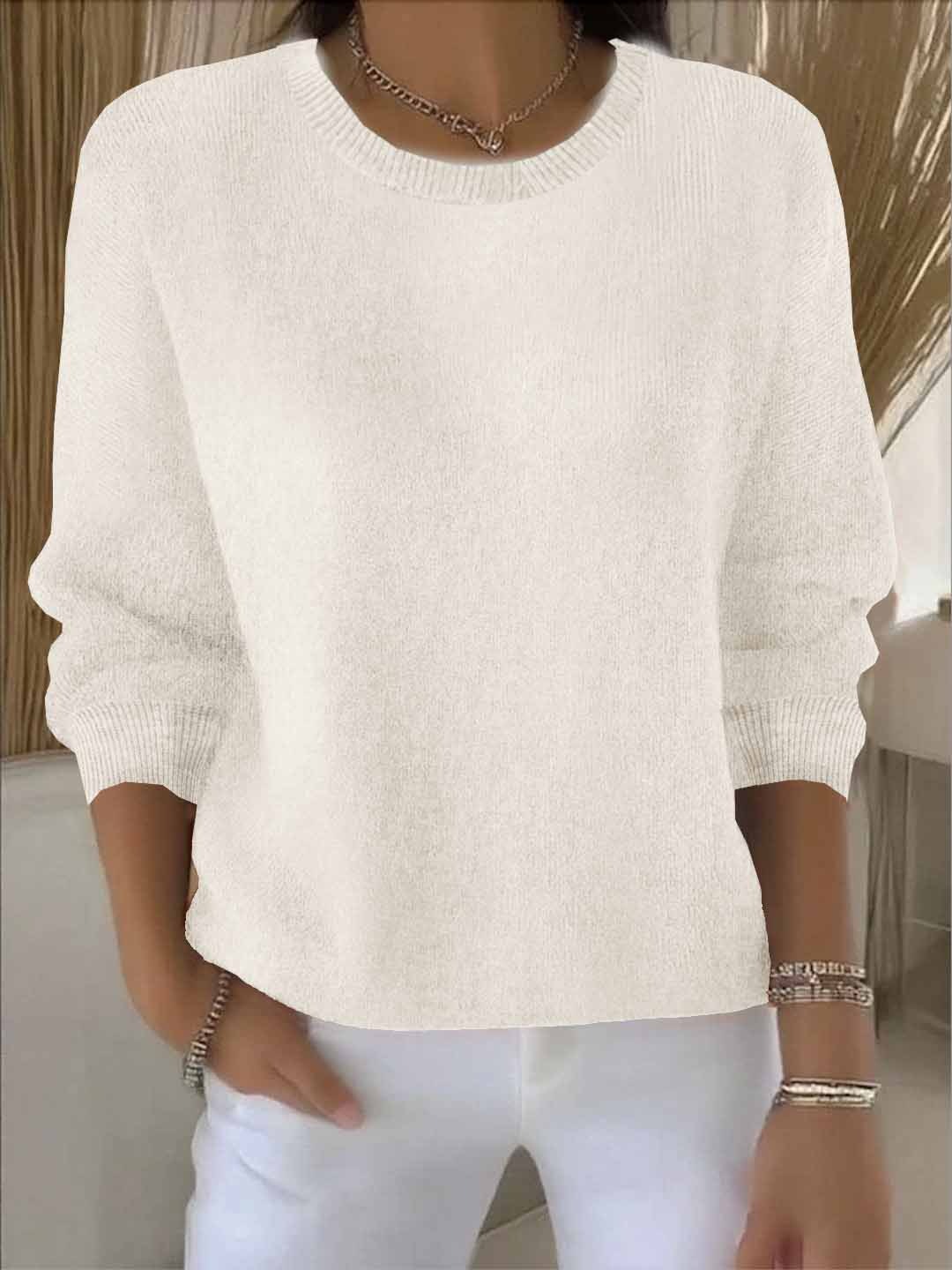 Soft knit women's sweater with a relaxed, flowy fit.