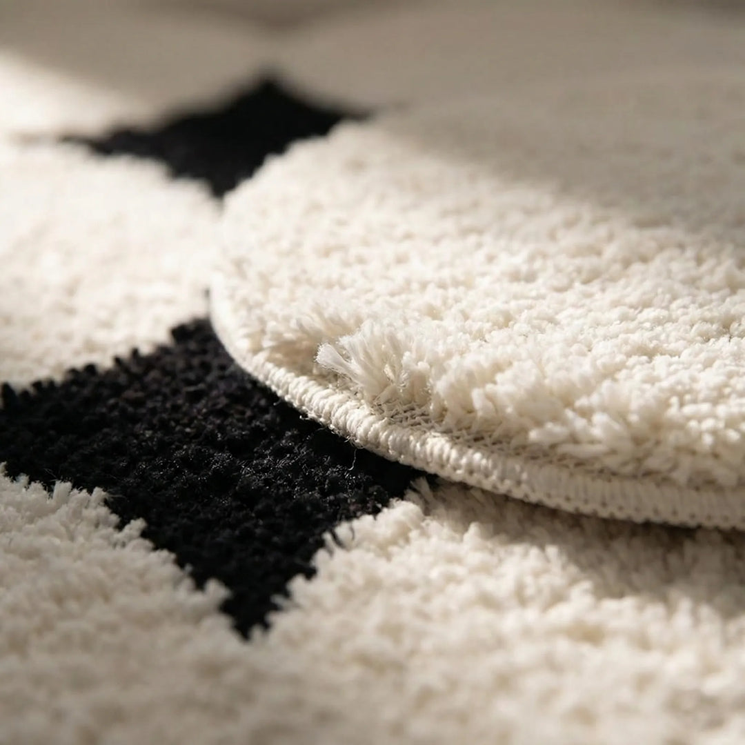 Plush cloud silhouette bathroom mat with wave texture. Non-slip & absorbent, offering soft floor protection & comfort.