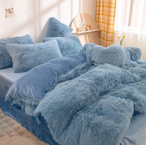 Soft duvet cover in a plush, candy-colored design; enhances cozy bedroom decor.