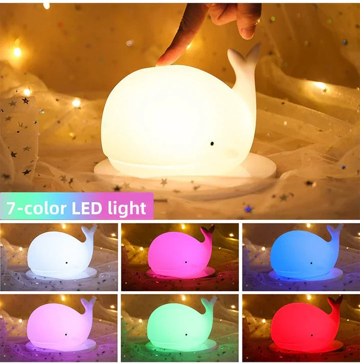 Adorable whale night light, perfect for kids' rooms or nursery decor, with calming color-changing LED.