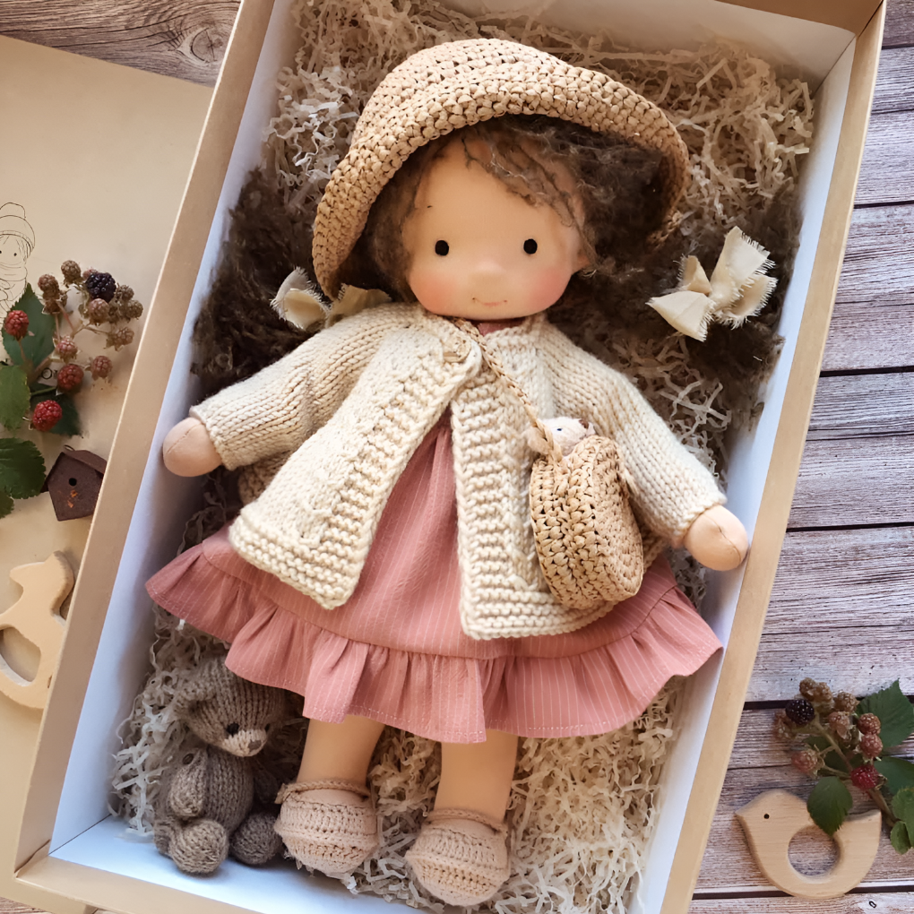 Soft Waldorf doll in natural colors, a cuddly imaginative children's play toy.