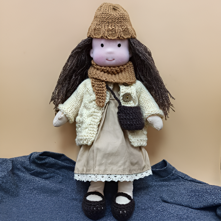 Waldorf doll, a timeless, soft & cuddly natural toy for enriching children's imaginative play.