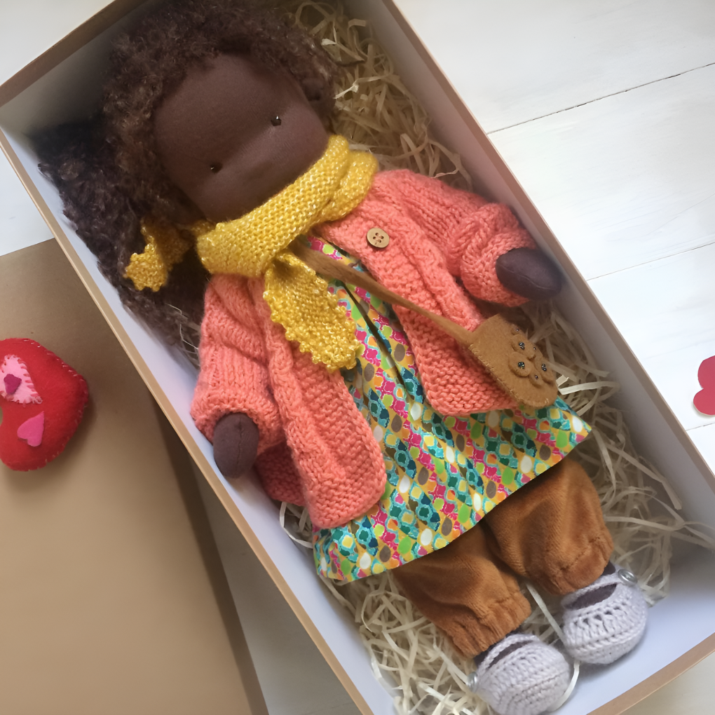 Toddler's Waldorf doll, a gentle cotton and wool toy for imaginative and educational play.