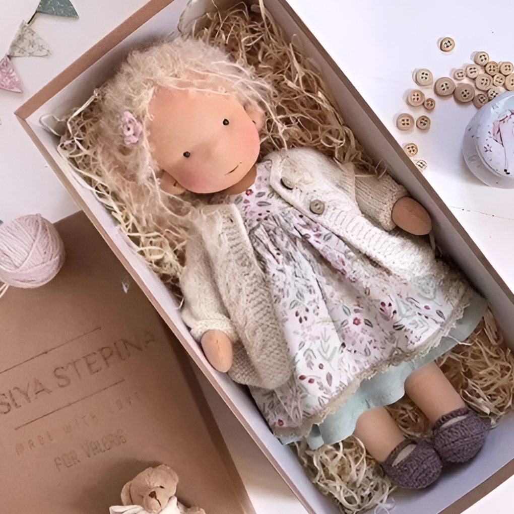 Soft cotton Waldorf doll, a natural material, cuddly toy for children's imaginative play.