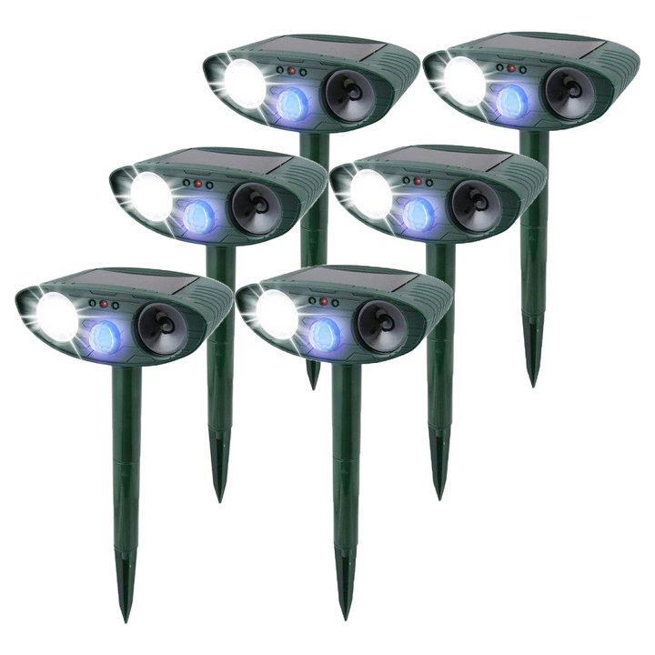 Outdoor humane rabbit deterrent with solar charging and flashing features to protect plants.