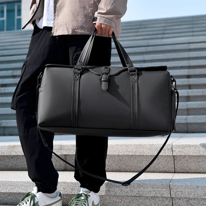 Sophisticated unisex travel duffle bag for weekend trips and carry-on convenience.