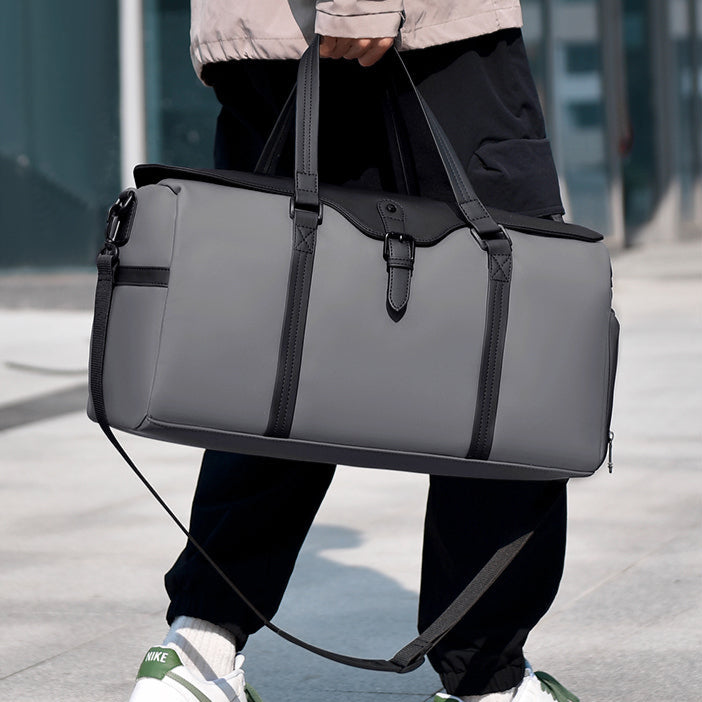 Organized travel duffle bag with multiple compartments, perfect for short trips and stylish travel.