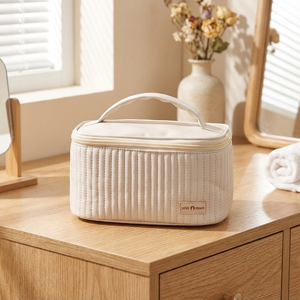 Spacious travel toiletry bag for organized essentials. Ideal for makeup, cosmetics & wash items on your journey.
