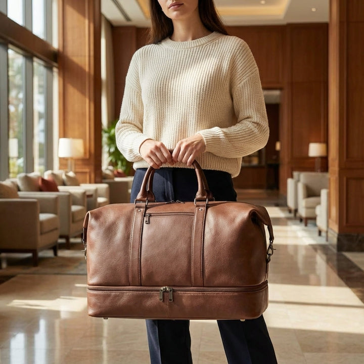 Spacious unisex leather weekender bag with dedicated shoe compartment. Perfect for travel & overnight trips.