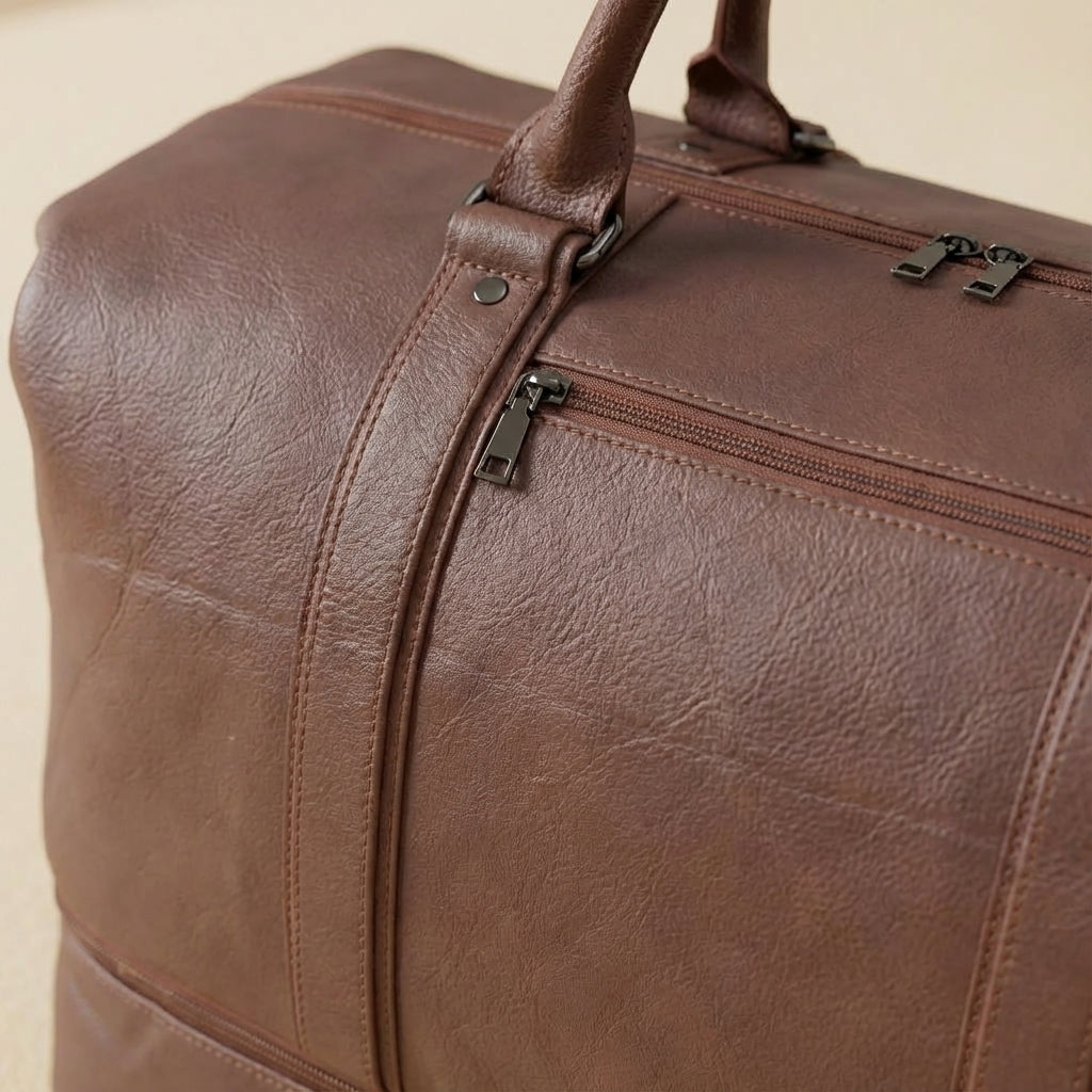 Stylish premium leather weekender bag, versatile travel duffel with ample space and a separate shoe compartment.